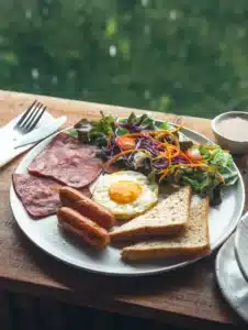 All day breakfast at Kacks Cafe, featuring eggs, toast, and salad.